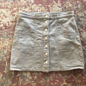 High waisted khaki colored button up jean skirt.
